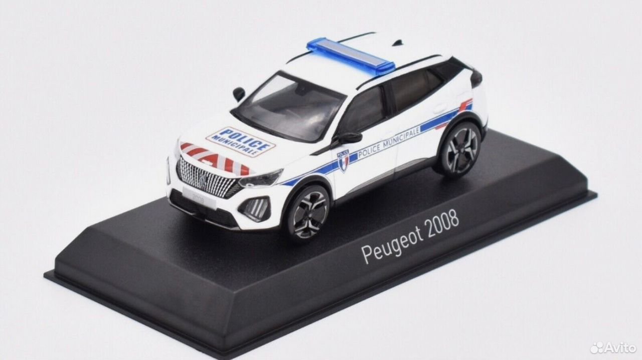 Коллекционная модель Peugeot 2008 полиция 2024 1:43 Norev